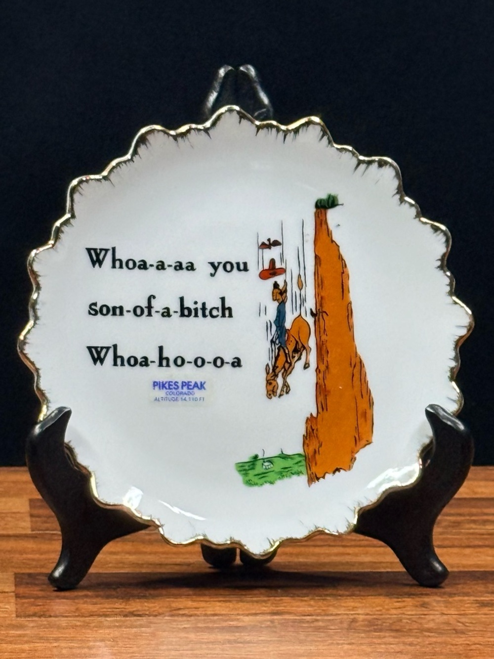 Decorative Plate Featuring a Humorous Illustration with Horse and Cowboy